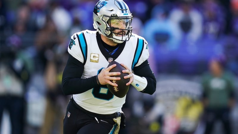 Carolina Panthers quarterback Baker Mayfield (6) looks to pass in the first half of an NFL...