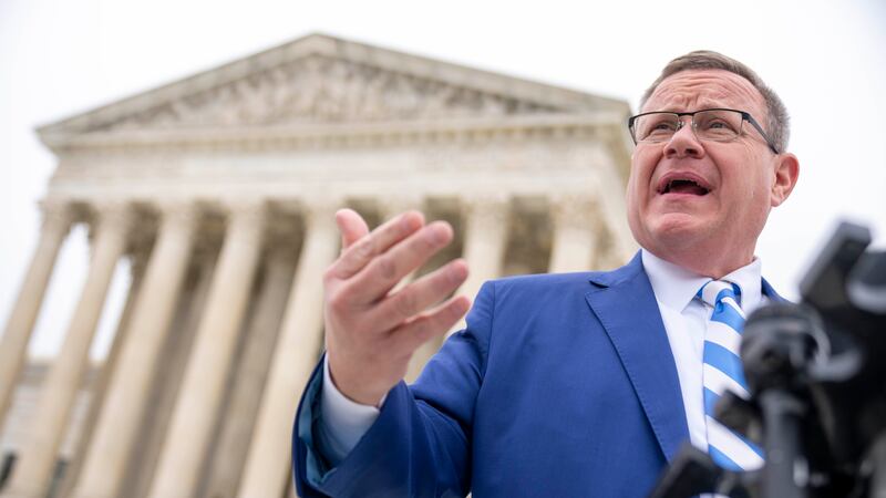 FILE - North Carolina House Speaker Tim Moore speaks in front of the Supreme Court in...