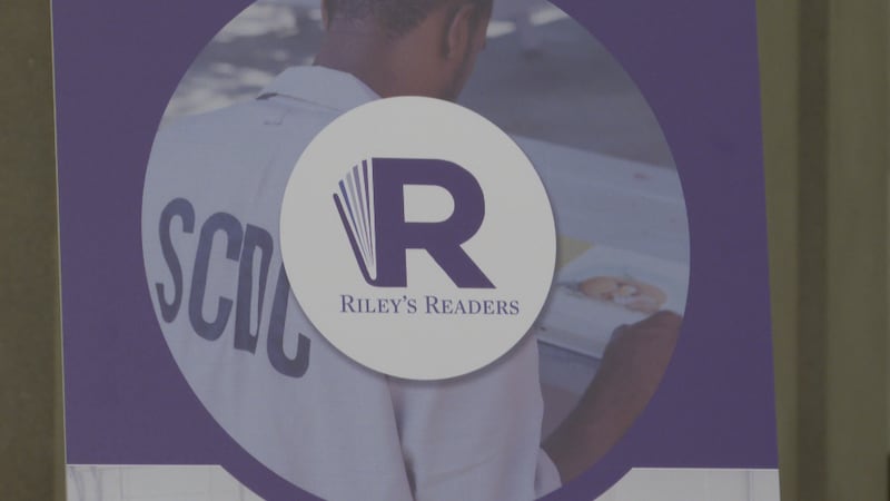 A sign for the Riley’s Readers program is displayed at the South Carolina State House in...