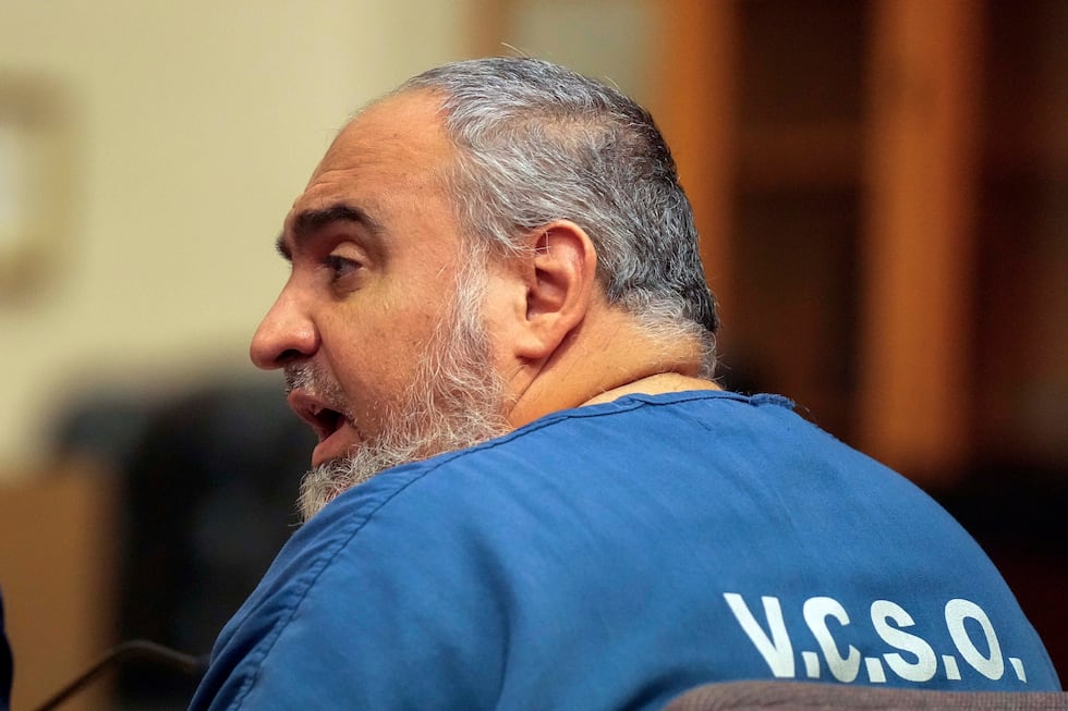 Loay Abdelfattah Alnaji, 50, a professor of computer science at Moorpark College, talks to his...