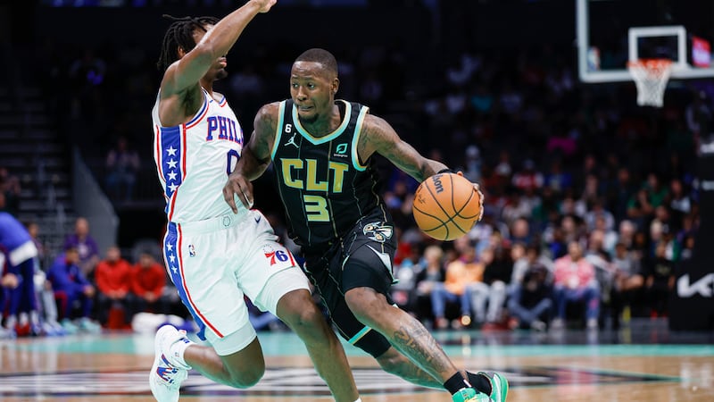 Charlotte Hornets guard Terry Rozier (3) drives into Philadelphia 76ers guard Tyrese Maxey...