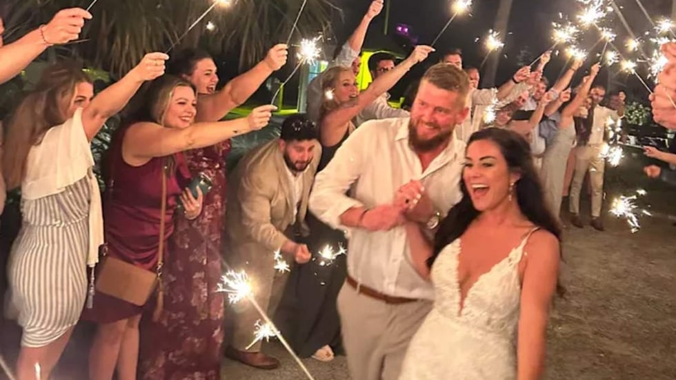 A photo posted on a GoFundMe account shows Aric and Samantha Hutchinson Friday on their...