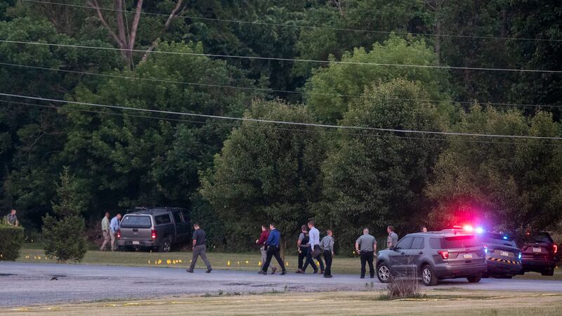 Law enforcement work the scene after a shooting near Mifflintown, Pa., Saturday, June 17,...