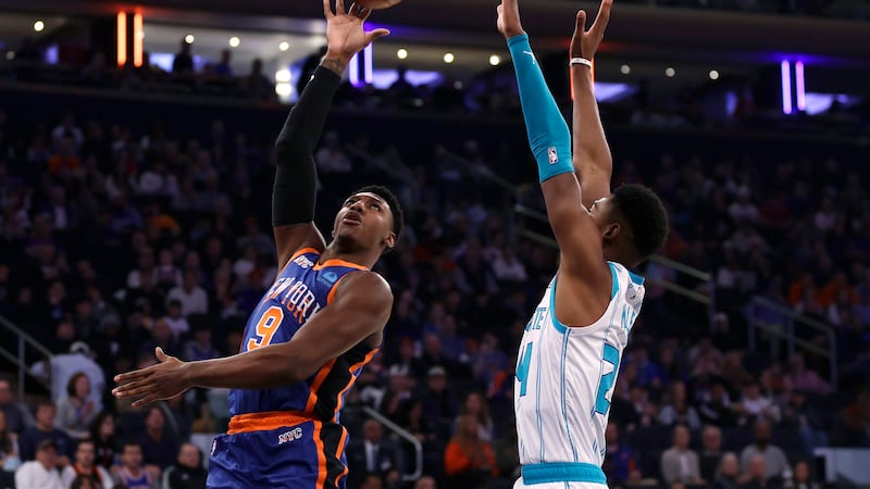 New York Knicks guard RJ Barrett (9) shoots over Charlotte Hornets forward Brandon Miller...