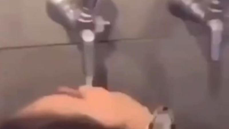An unidentified woman was recorded drinking directly from a tap at Hoppin' in Charlotte.