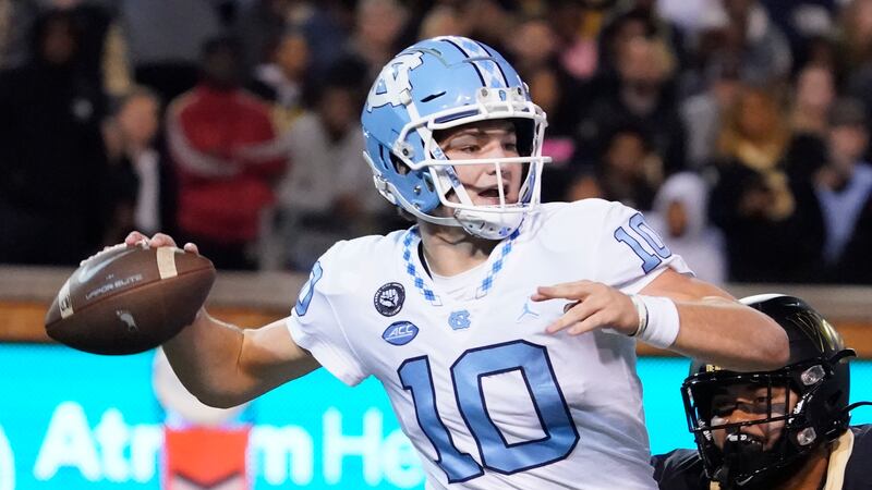 North Carolina quarterback Drake Maye (10) looks to pass against Wake Forest during the first...