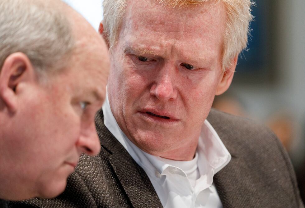 Alex Murdaugh talks with his defense attorney Jim Griffin during his trial at the Colleton...