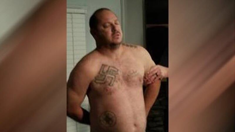 Fayetteville police released this photo of Bowden being arrested by US Marshals and officers...