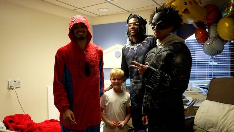 Hornets players Amari Bailey, Brandon Miller and Nick Smith Jr. visited patients at Novant...